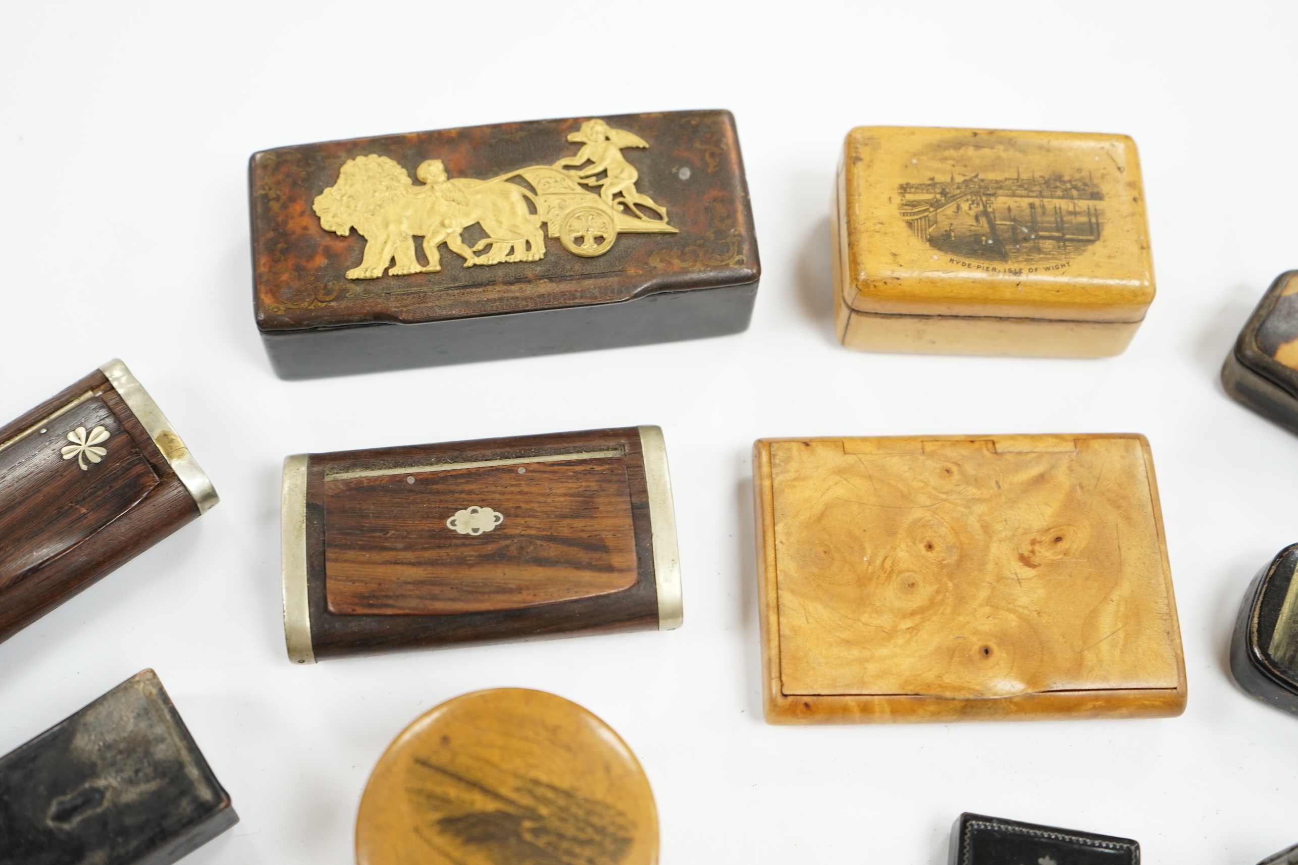 Ten 19th century and later snuff boxes, one mounted with gilt metal chariot scene, and two Mauchlineware boxes, largest chariot scene box 10cm wide. Condition - fair for use and age